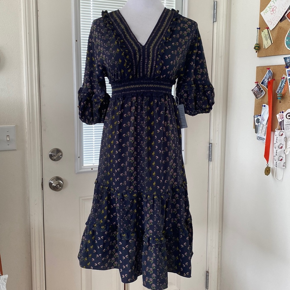 Beautiful navy blue floral midi dress with puffy sleeve and ruffle detail